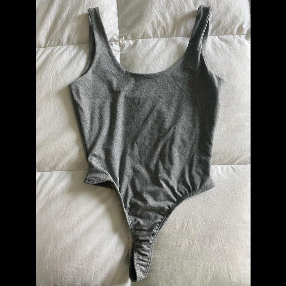 Gray tee body suit. No snap buttons.